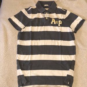 Abercrombie and Fitch polo. Size Medium. Gray and white horizontal stripes